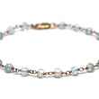 London Blue Topaz Bracelet in Wire Wrapped Rose Gold