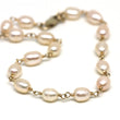 Light Peach Pearl Bracelet in Wire Wrapped Gold