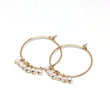 Pearl Hoop Earrings in Gold